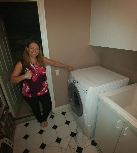 Elevate Repair appliance technician completing a repair in Denver