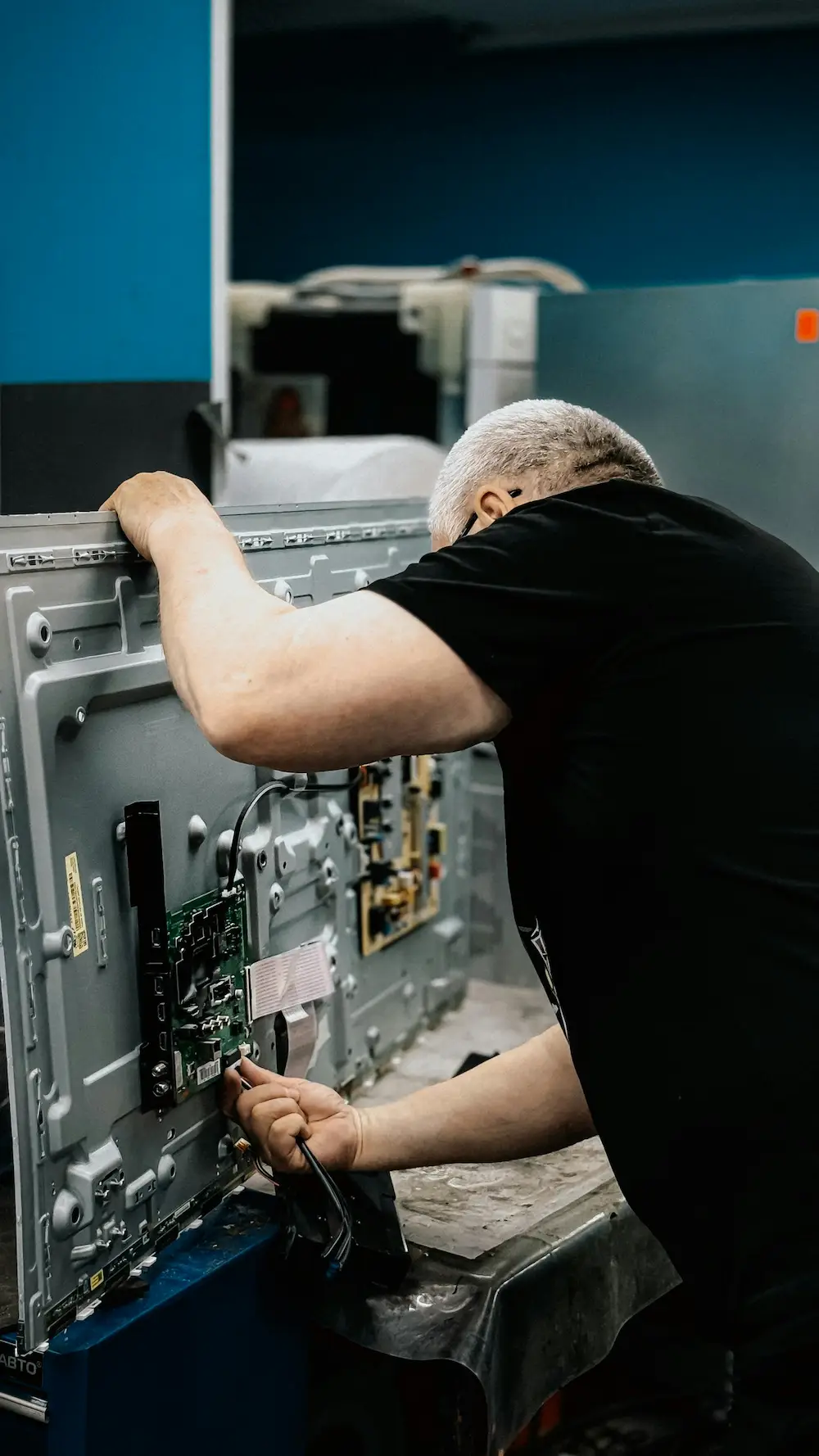 Elevate Repair appliance technician completing a repair in New York City